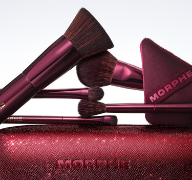 Morphe makeup brushes and case on a light gray background