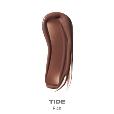 {Tide} Morphe Complexion Boost Peptide Bronzing Serum swatch in Tide, a tan shade with a warm, shimmering finish