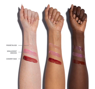 Three swatches of lipsticks on different skin tones with labels.